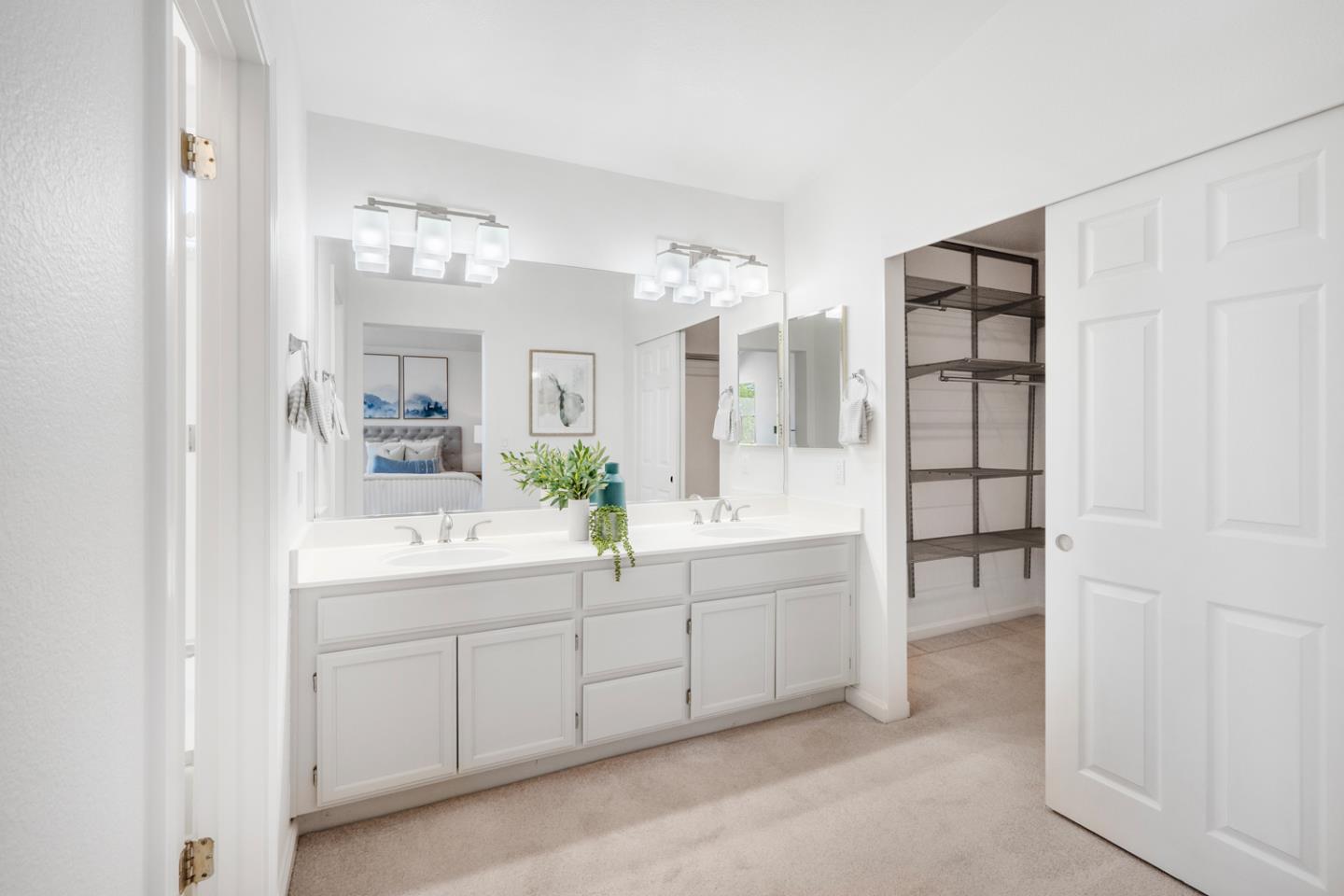 581 Eden Street Gilroy, CA 95020 - Photo 13 of 40 a spacious bathroom with a double vanity sink and mirror