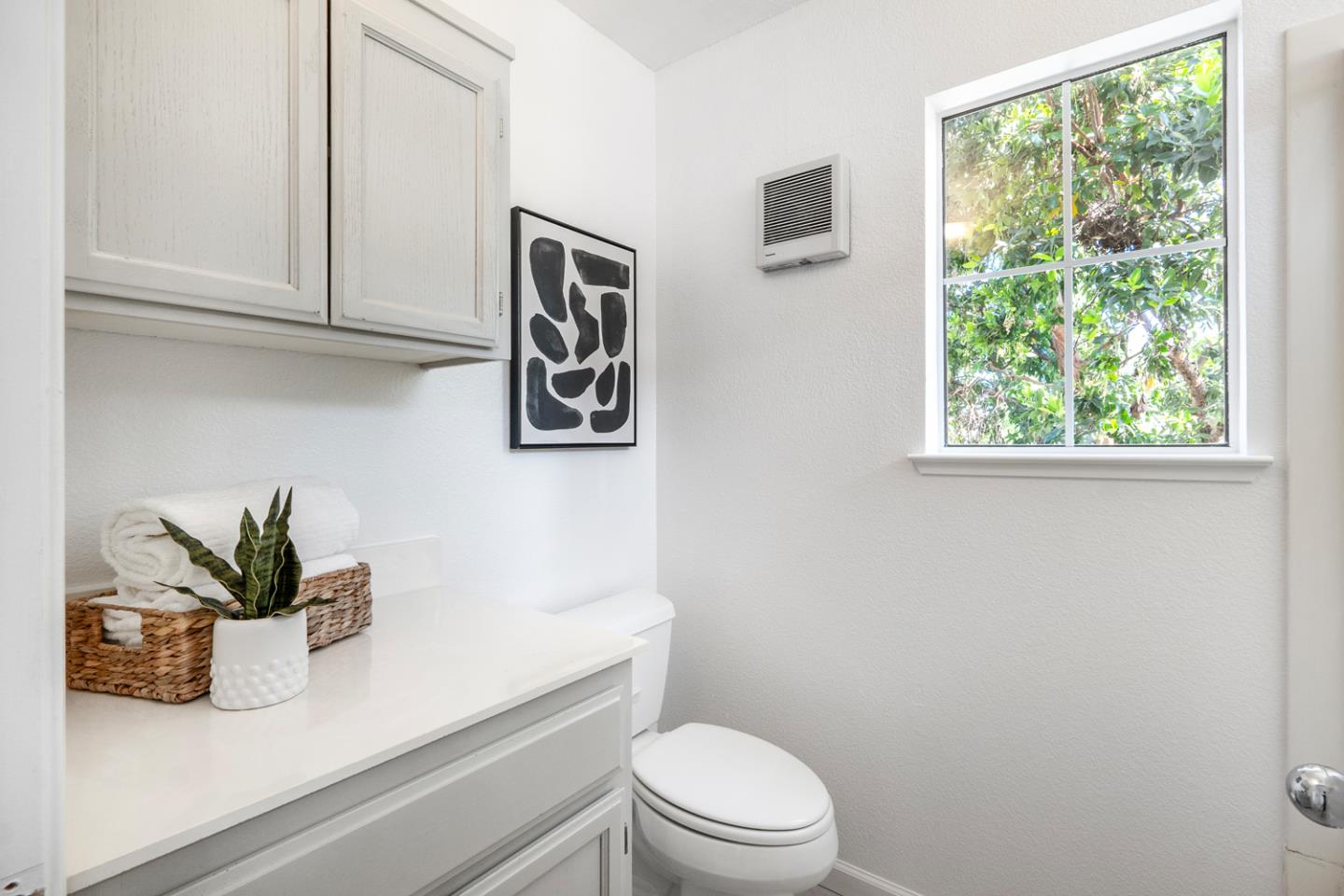581 Eden Street Gilroy, CA 95020 - Photo 15 of 40 a bathroom with a toilet a sink and window
