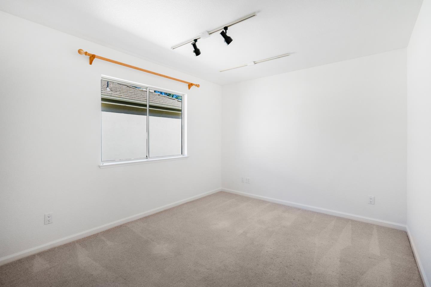 581 Eden Street Gilroy, CA 95020 - Photo 17 of 40 an empty room with a window