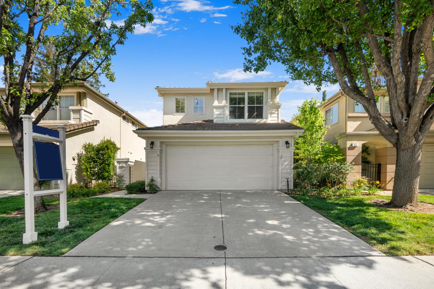 581 Eden Street Gilroy, CA 95020 - Photo 2 of 40 a front view of a house with a yard and a garage