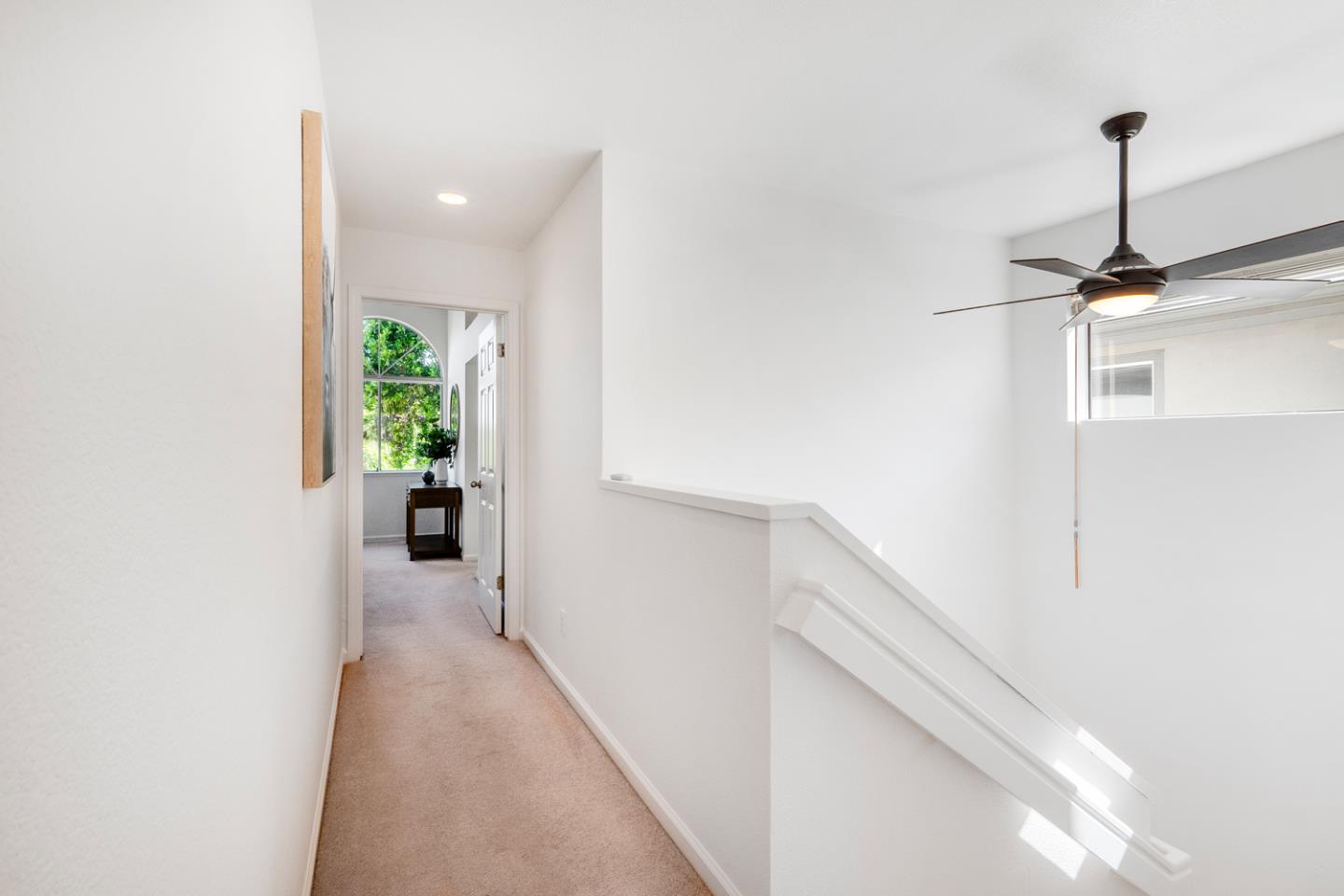 581 Eden Street Gilroy, CA 95020 - Photo 24 of 40 a hallway with a dining table and chairs