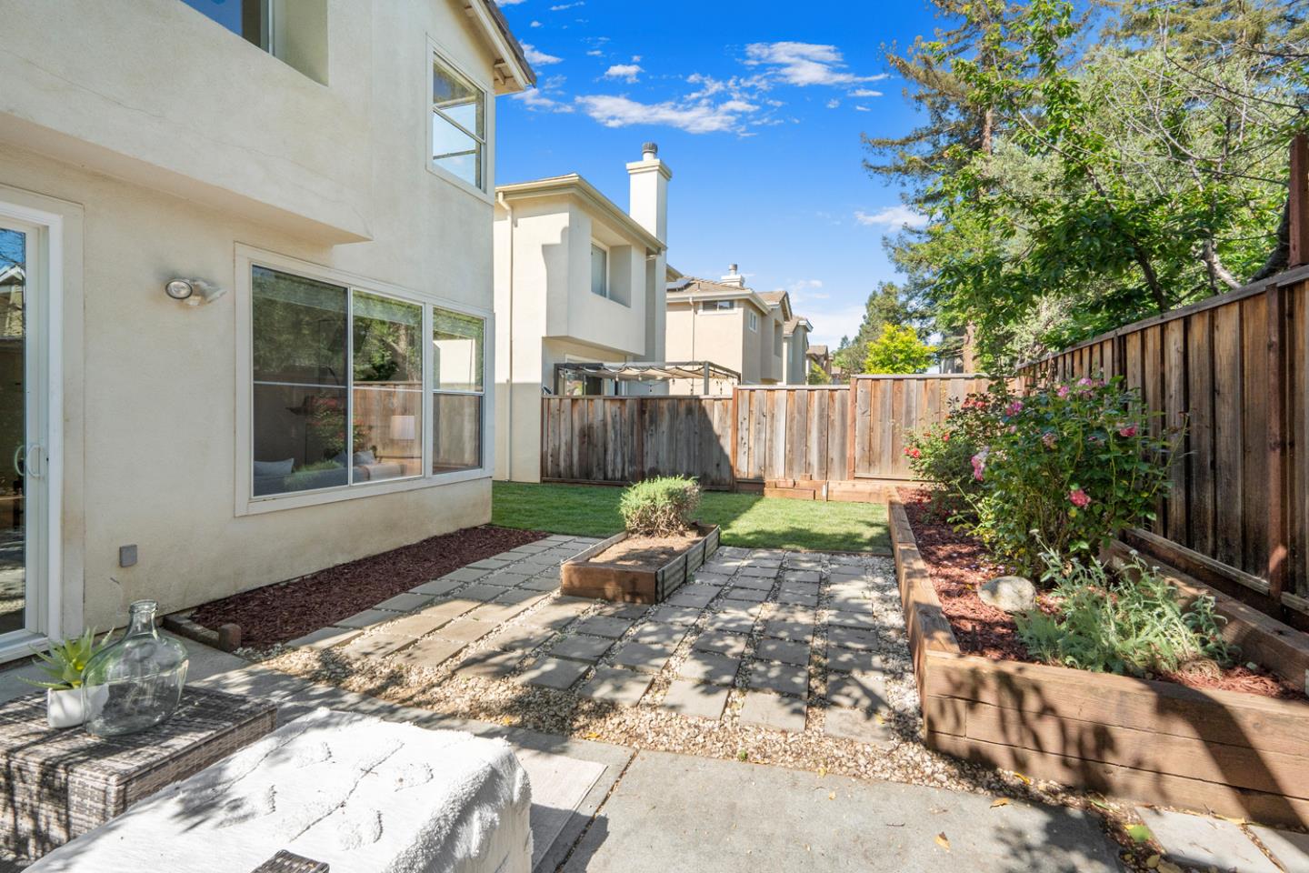 581 Eden Street Gilroy, CA 95020 - Photo 30 of 40 a backyard of a house with a garden and barbeque oven