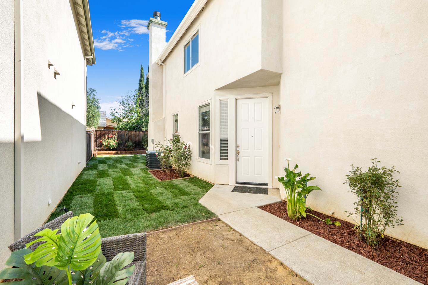 581 Eden Street Gilroy, CA 95020 - Photo 3 of 40 a view of a garden with potted plants