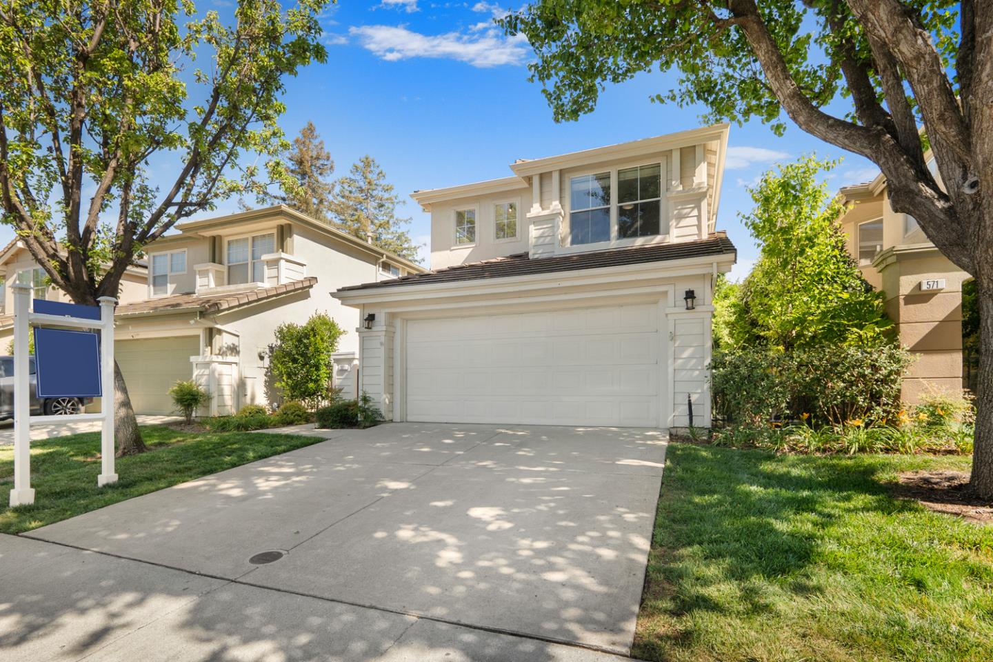 581 Eden Street Gilroy, CA 95020 - Photo 34 of 40 a front view of a house with a garden and trees