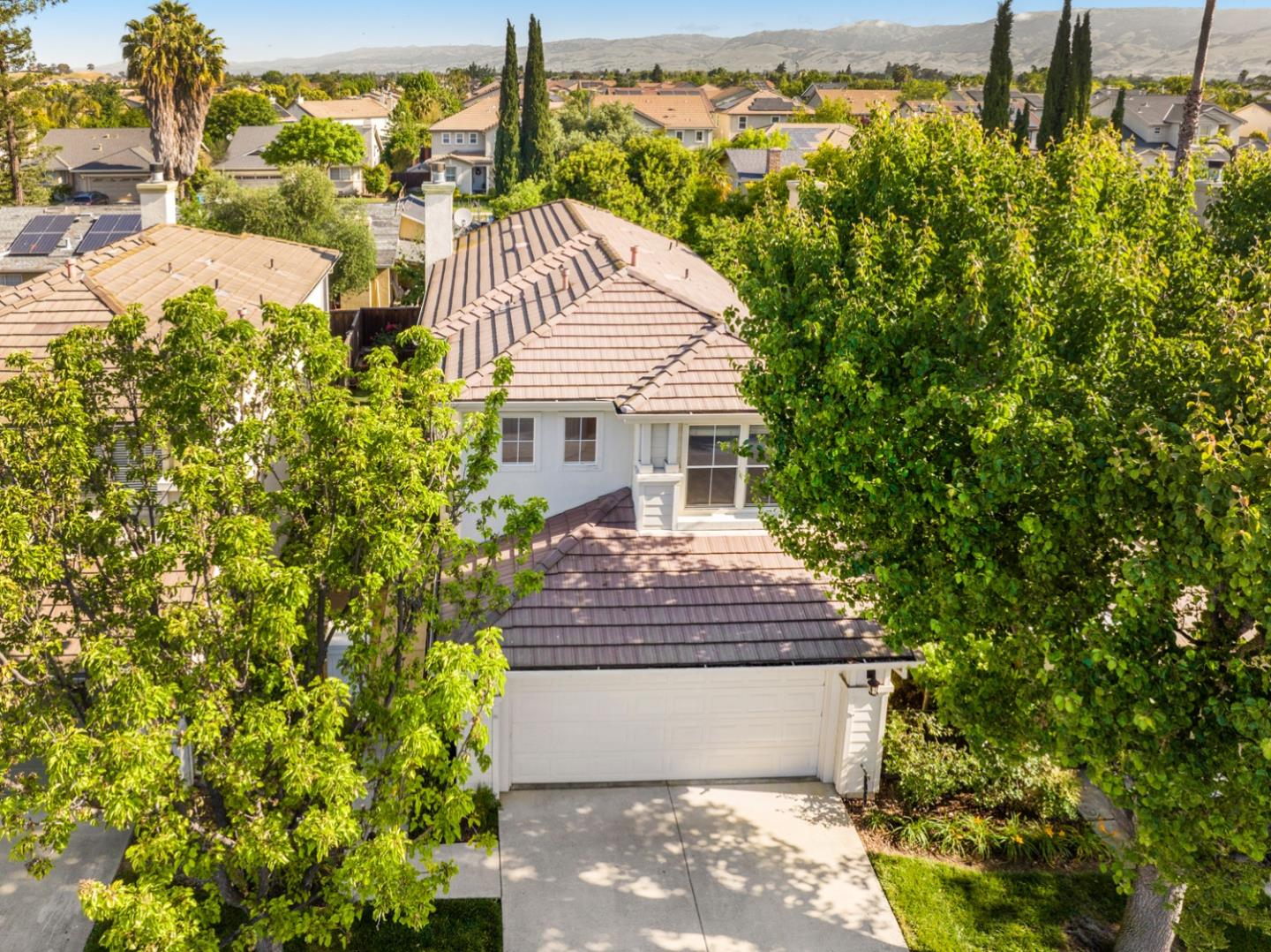 581 Eden Street Gilroy, CA 95020 - Photo 35 of 40 a front view of a house with a yard and garage