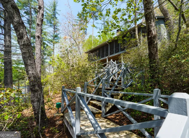 a view of a backyard of the house