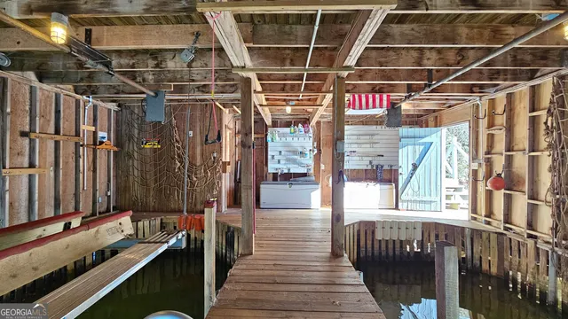 a view of a balcony furniture and living room