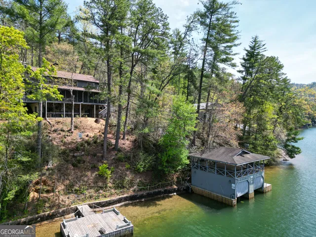 a view of outdoor space with wooden floor and outdoor seating