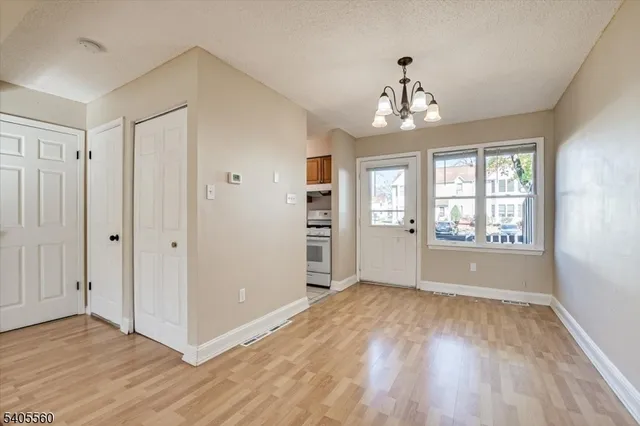 a view of a livingroom with wooden floor
