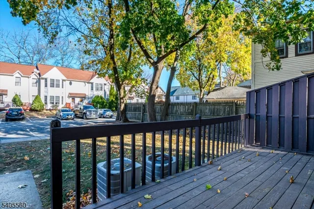 a view of a street with wooden stairs