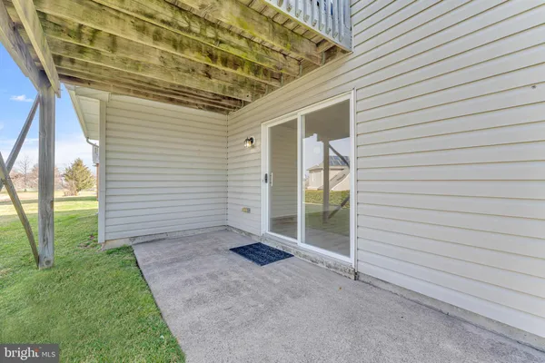 a view of backyard with porch