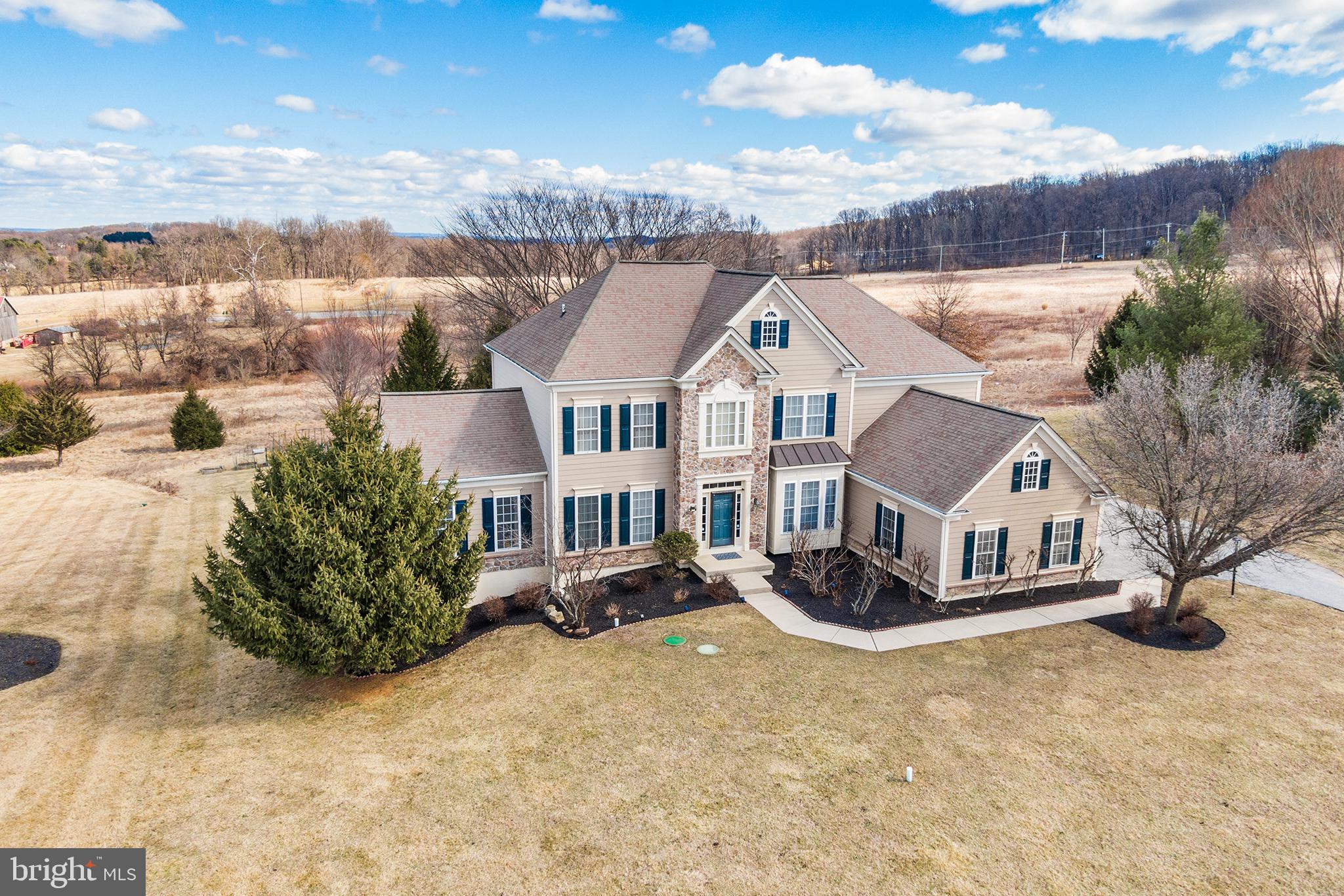 72 Hollow Drive Malvern, PA 19355 - Photo 1 of 63 a view of a house with a yard covered in snow