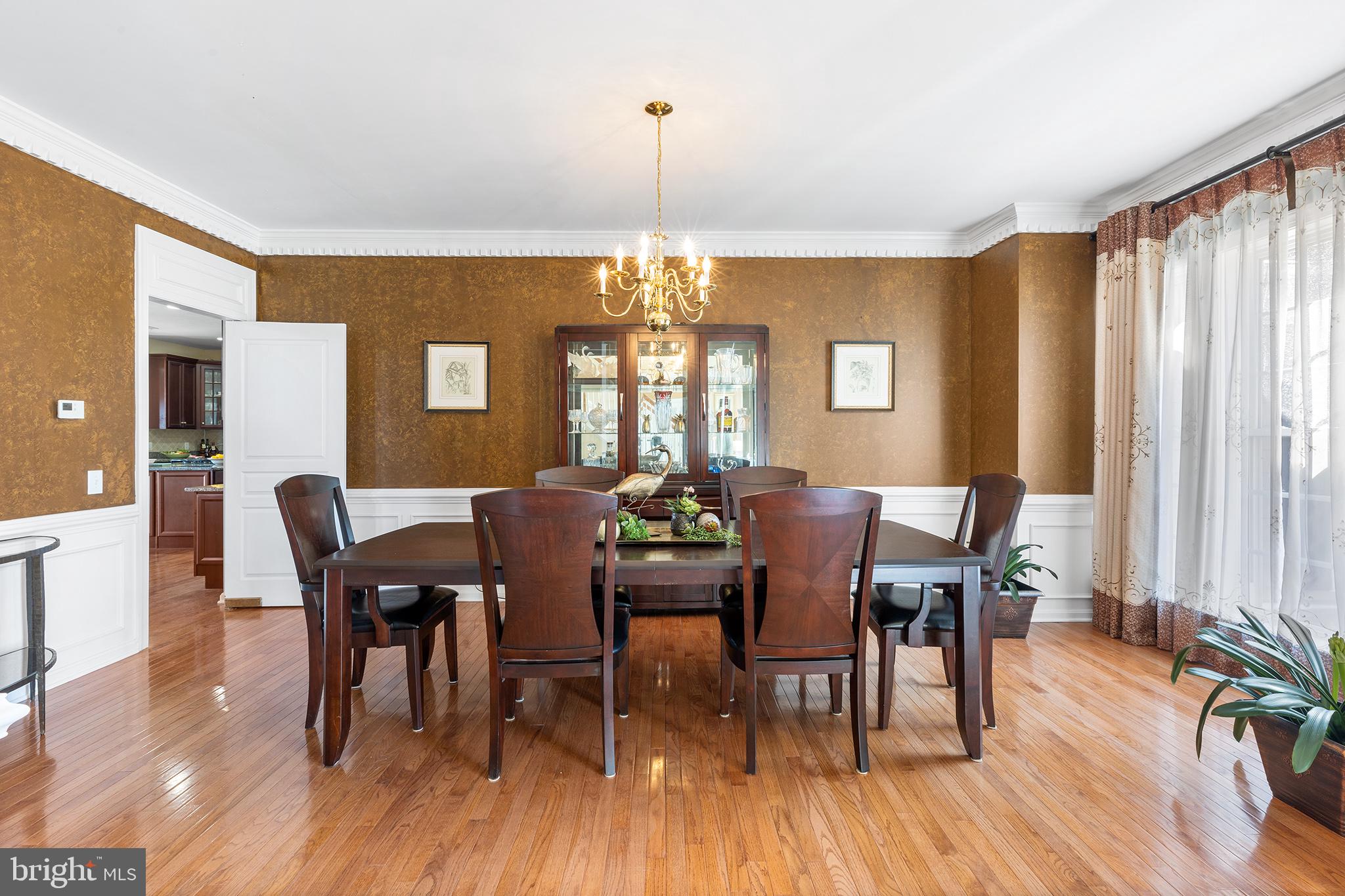 72 Hollow Drive Malvern, PA 19355 - Photo 11 of 63 a view of a dining room with furniture window and wooden floor