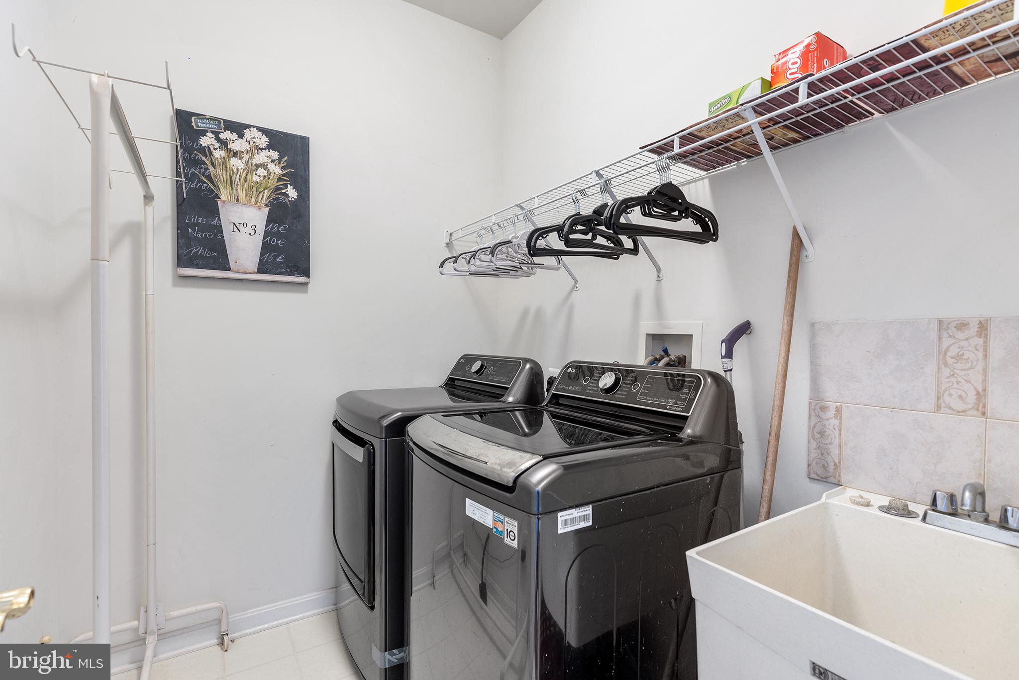 72 Hollow Drive Malvern, PA 19355 - Photo 18 of 63 a kitchen with stainless steel appliances granite countertop a sink a stove and a refrigerator