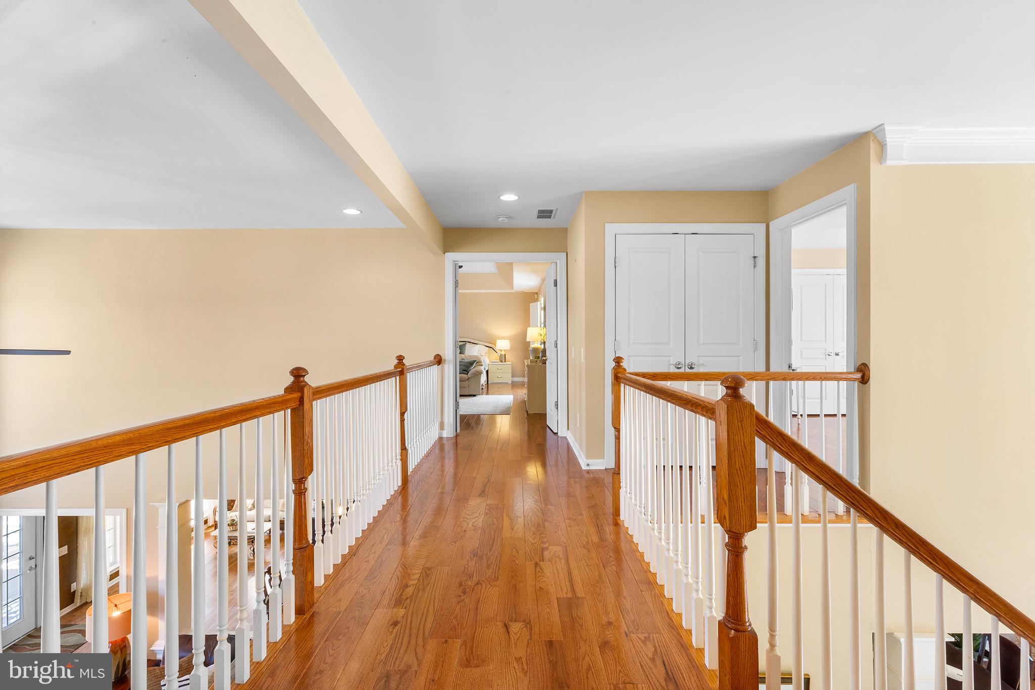 72 Hollow Drive Malvern, PA 19355 - Photo 19 of 63 a view of a hallway with wooden floor and stairs