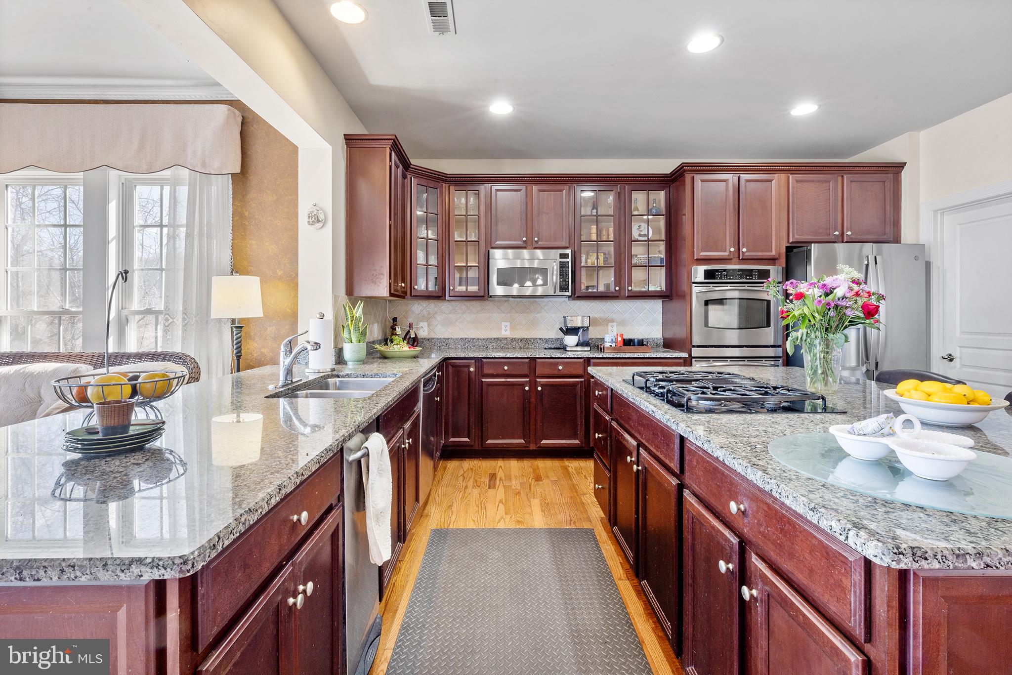 72 Hollow Drive Malvern, PA 19355 - Photo 2 of 63 a kitchen with stainless steel appliances granite countertop a stove and a sink