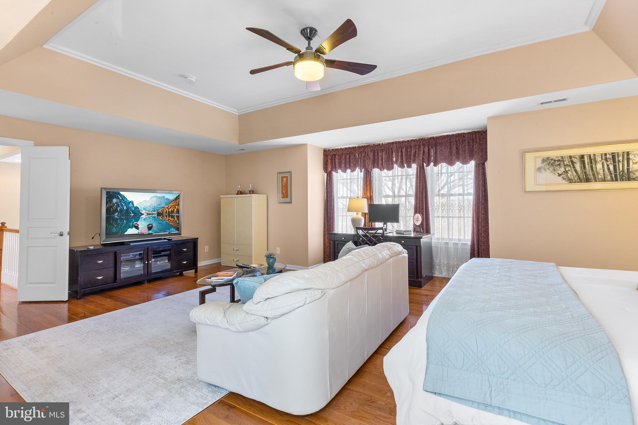 72 Hollow Drive Malvern, PA 19355 - Photo 21 of 63 a living room with furniture and a flat screen tv