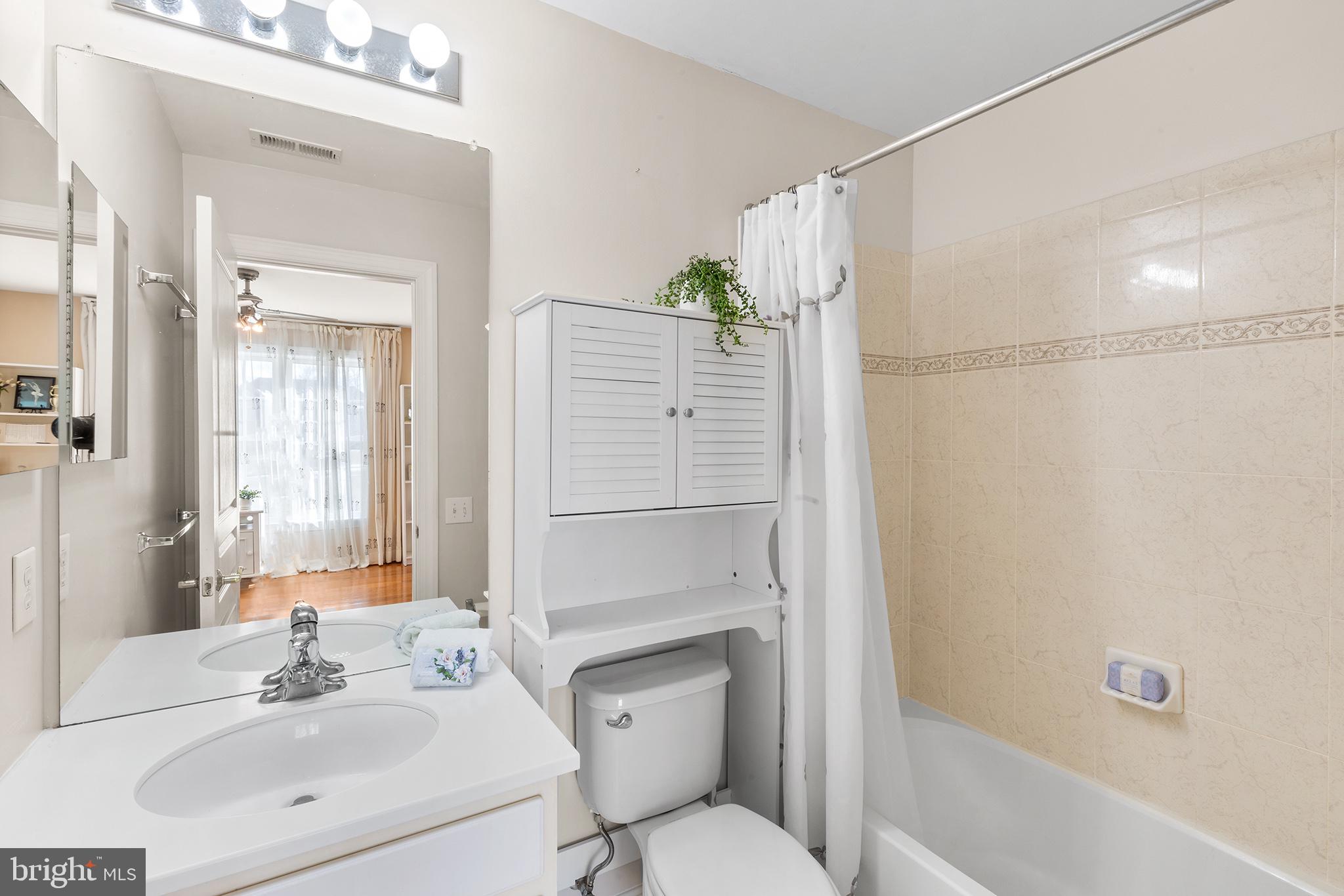 72 Hollow Drive Malvern, PA 19355 - Photo 27 of 63 a bathroom with a sink toilet and shower