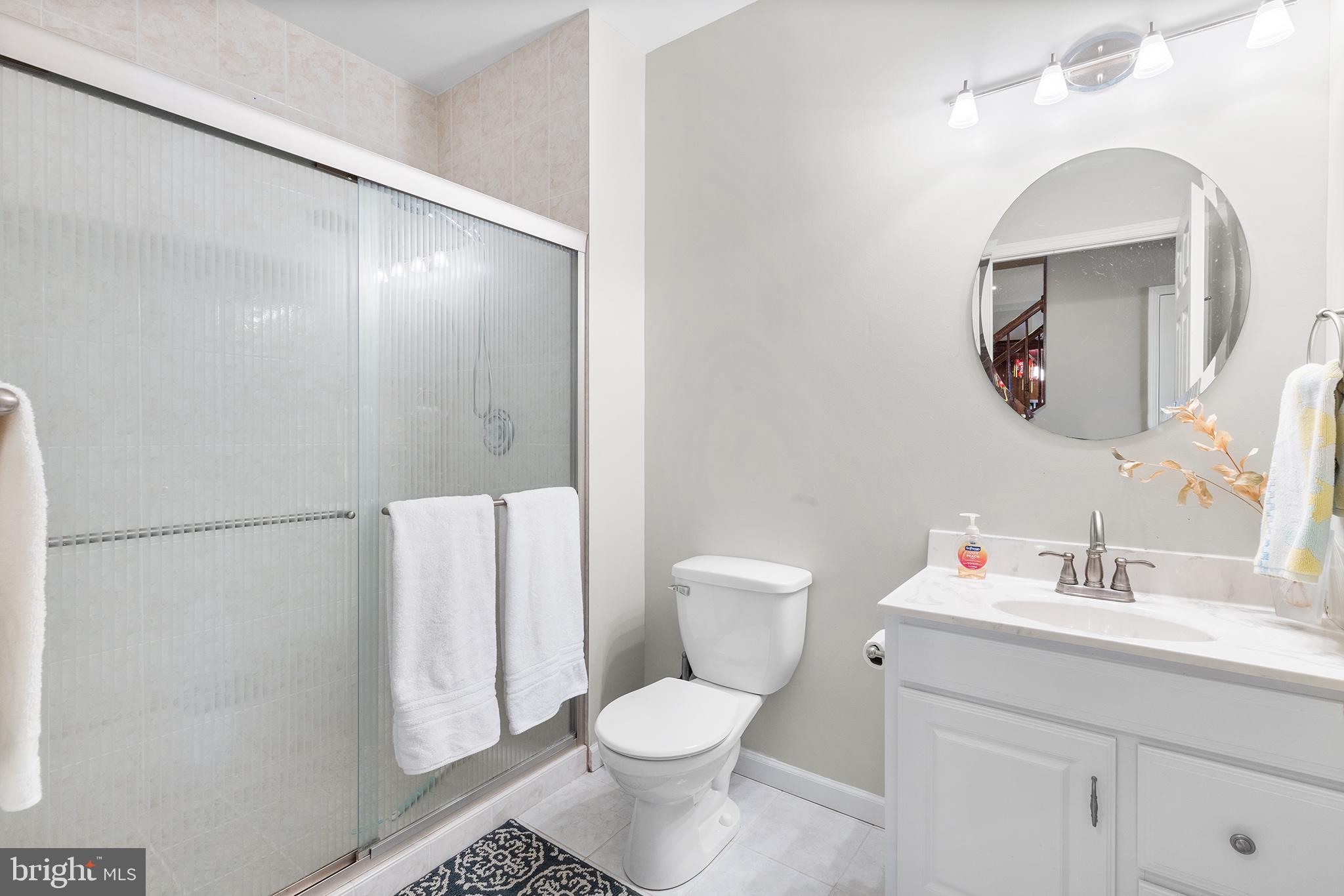 72 Hollow Drive Malvern, PA 19355 - Photo 35 of 63 a bathroom with a toilet sink and mirror