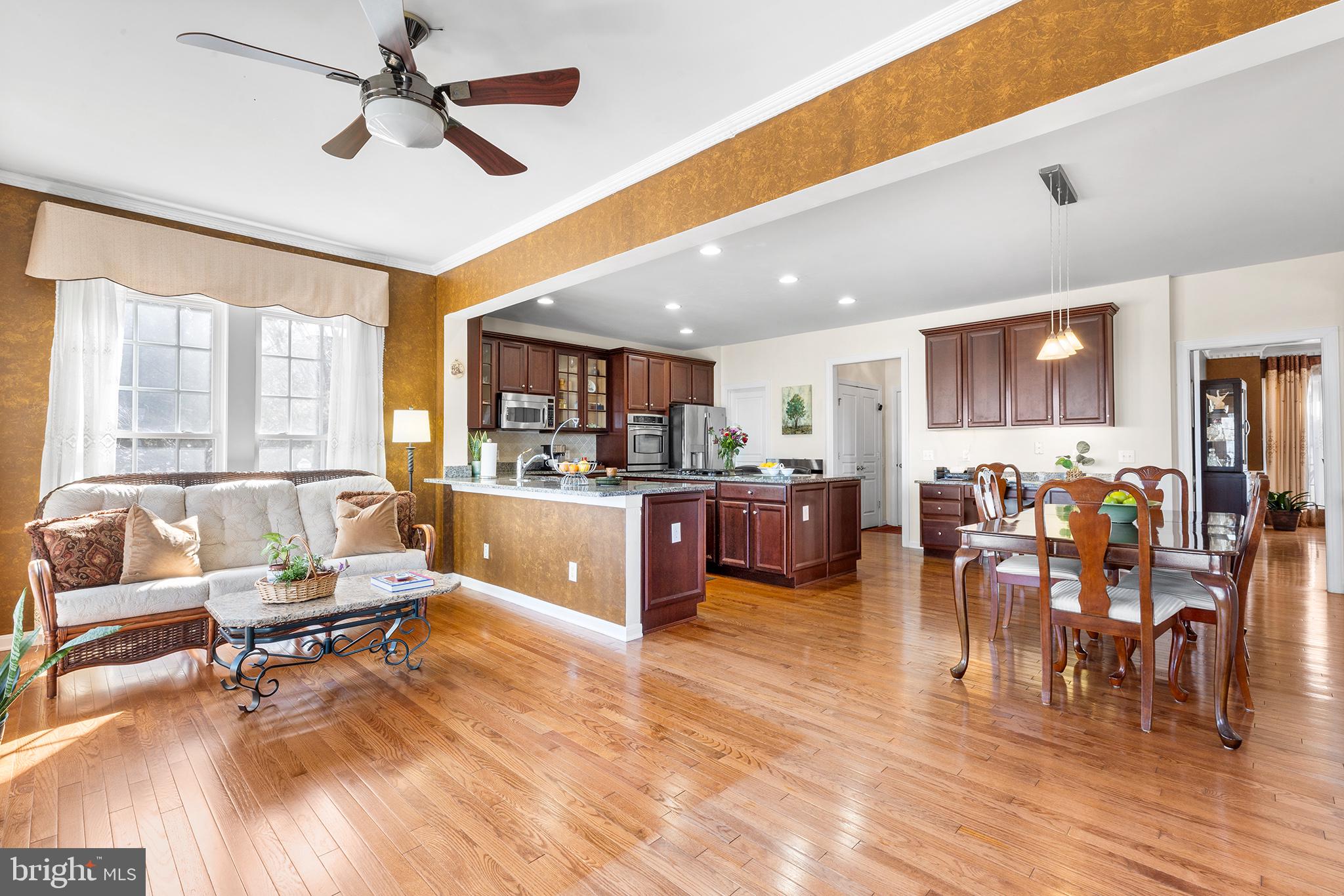 72 Hollow Drive Malvern, PA 19355 - Photo 5 of 63 a living room with lots of furniture and kitchen view