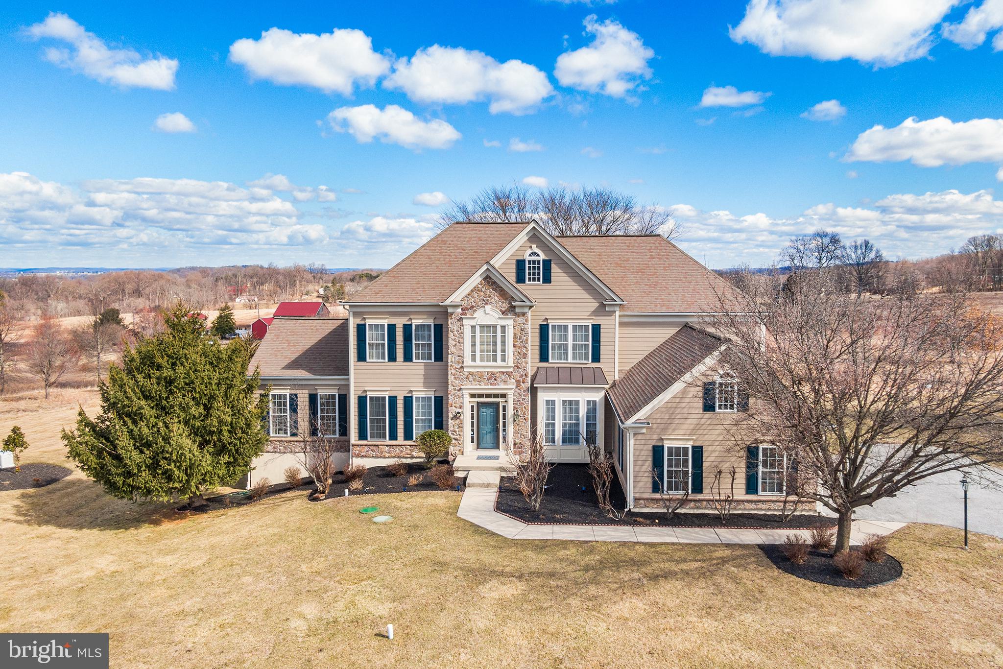 72 Hollow Drive Malvern, PA 19355 - Photo 53 of 63 a view of a white house with a large tree in front of it