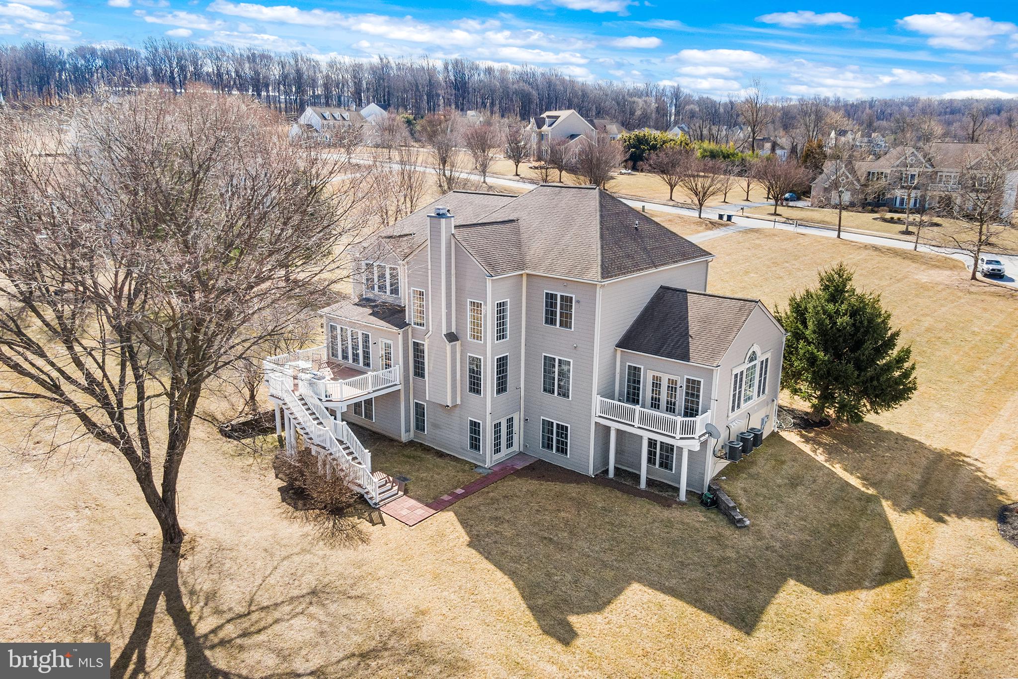 72 Hollow Drive Malvern, PA 19355 - Photo 58 of 63 a view of a house with a yard covered in snow