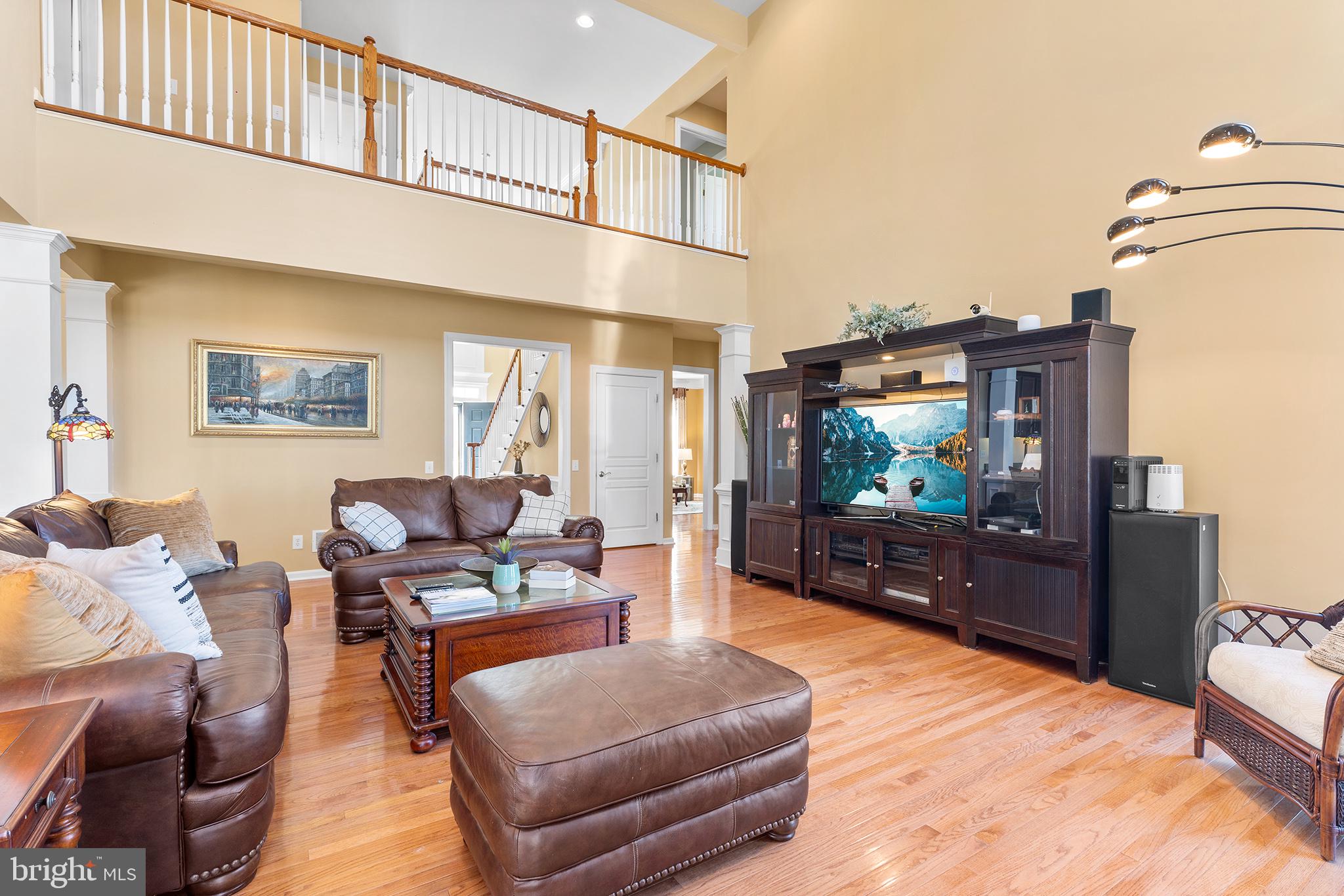 72 Hollow Drive Malvern, PA 19355 - Photo 6 of 63 a living room with furniture and a flat screen tv