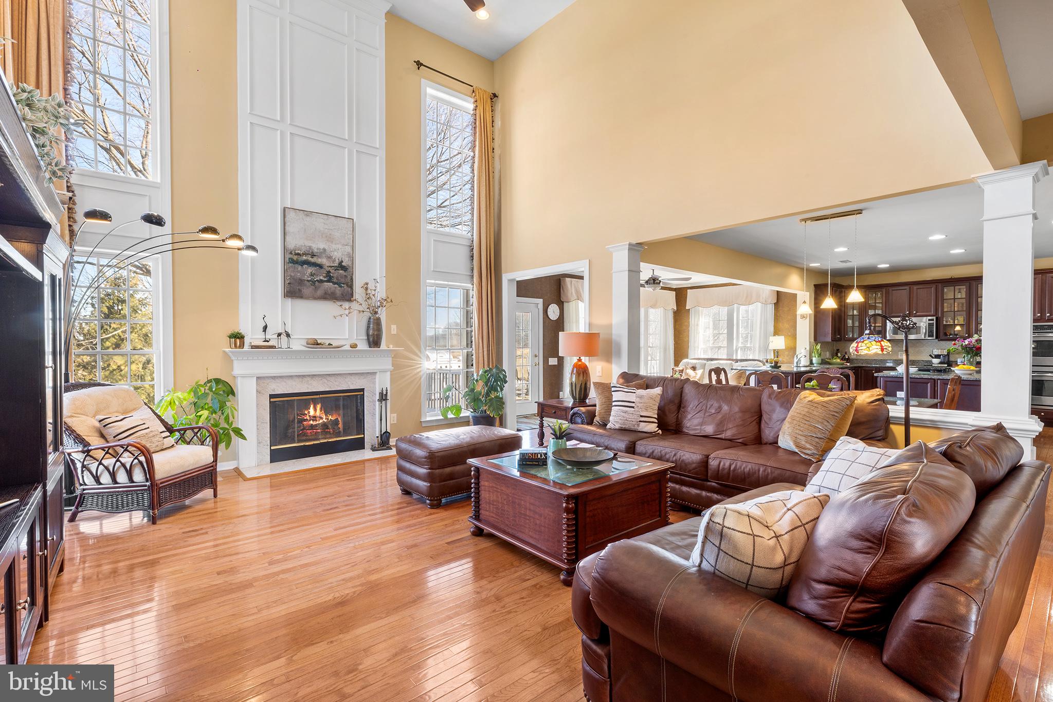 72 Hollow Drive Malvern, PA 19355 - Photo 9 of 63 a living room with furniture fireplace and a large window