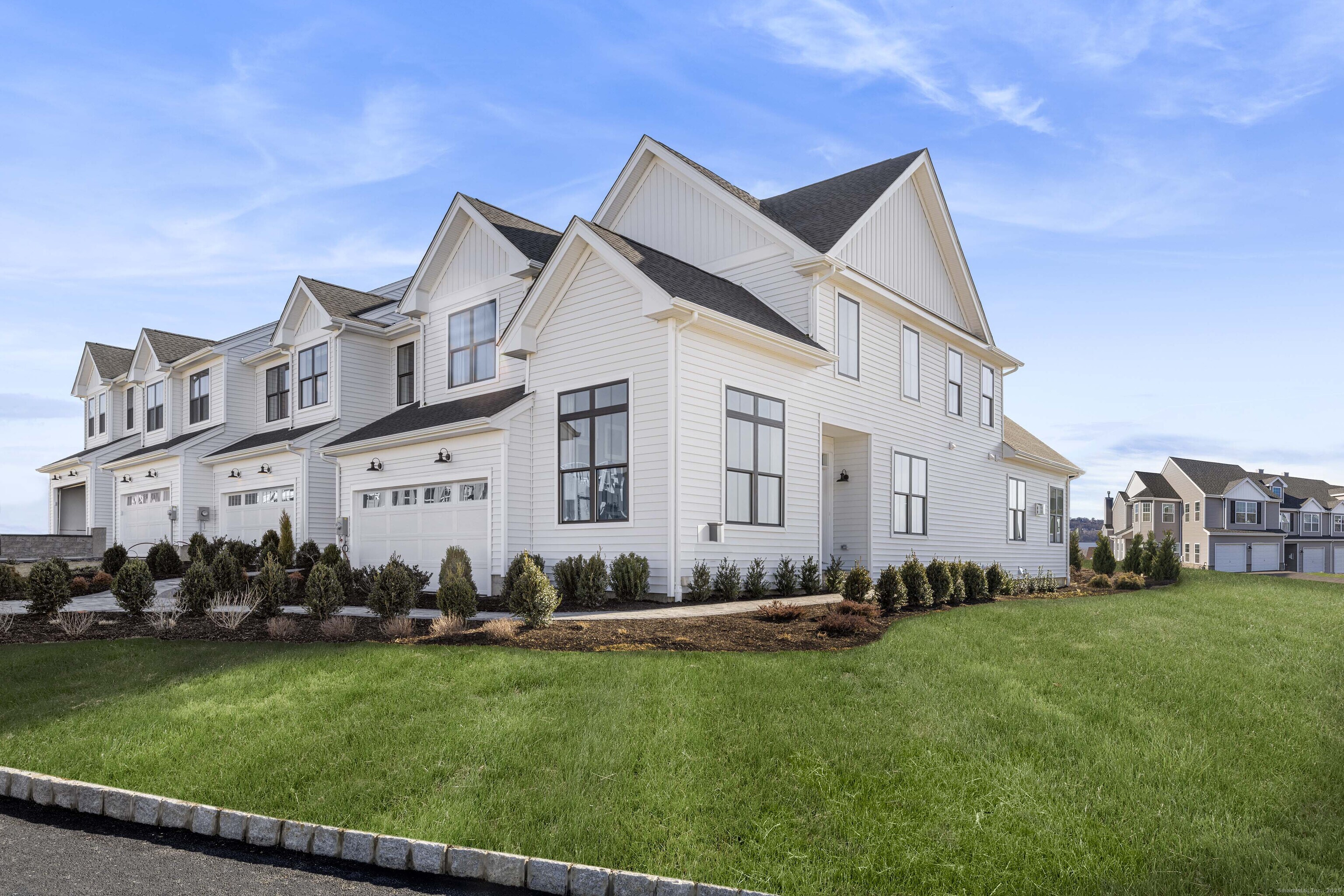 21 Bramble Way, Unit HOMESITE 68 Brookfield, CT 06804 - Photo 1 of 1 a front view of a house with a yard