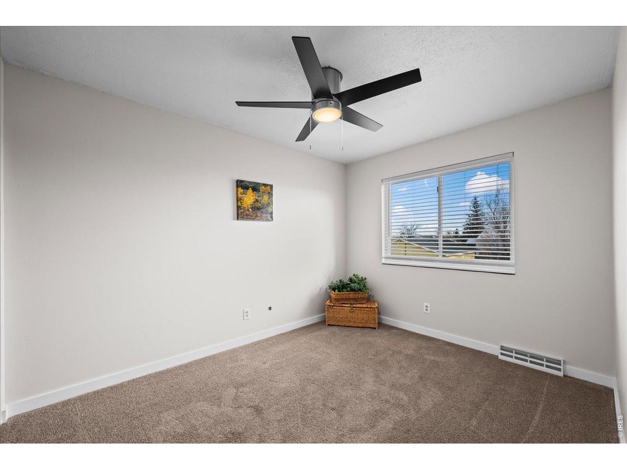 516 West Main Street Pierce, CO 80650 - Photo 13 of 24 a view of an empty room with a window