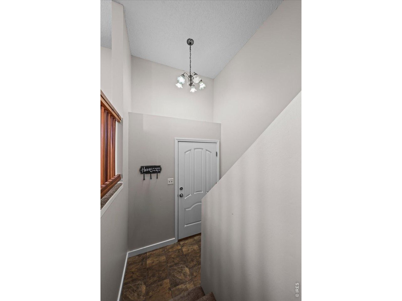 516 West Main Street Pierce, CO 80650 - Photo 15 of 24 a view of a hallway with a white walls