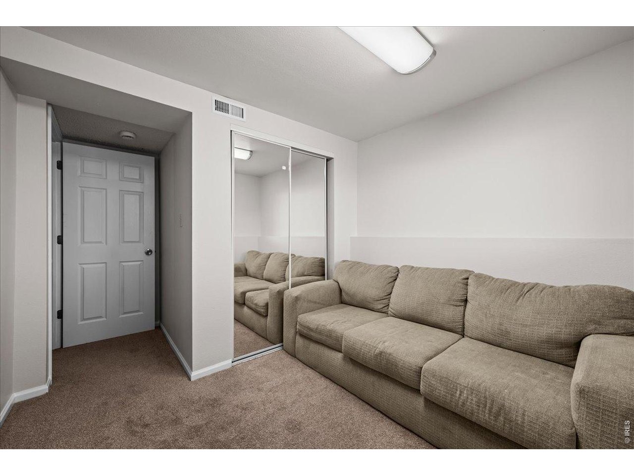 516 West Main Street Pierce, CO 80650 - Photo 20 of 24 a living room with furniture and a couch
