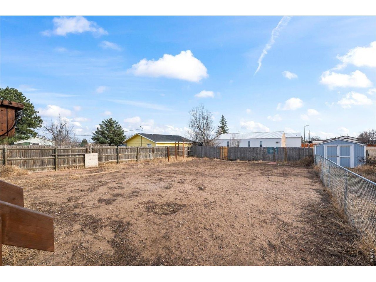516 West Main Street Pierce, CO 80650 - Photo 24 of 24 a view of a house with a yard