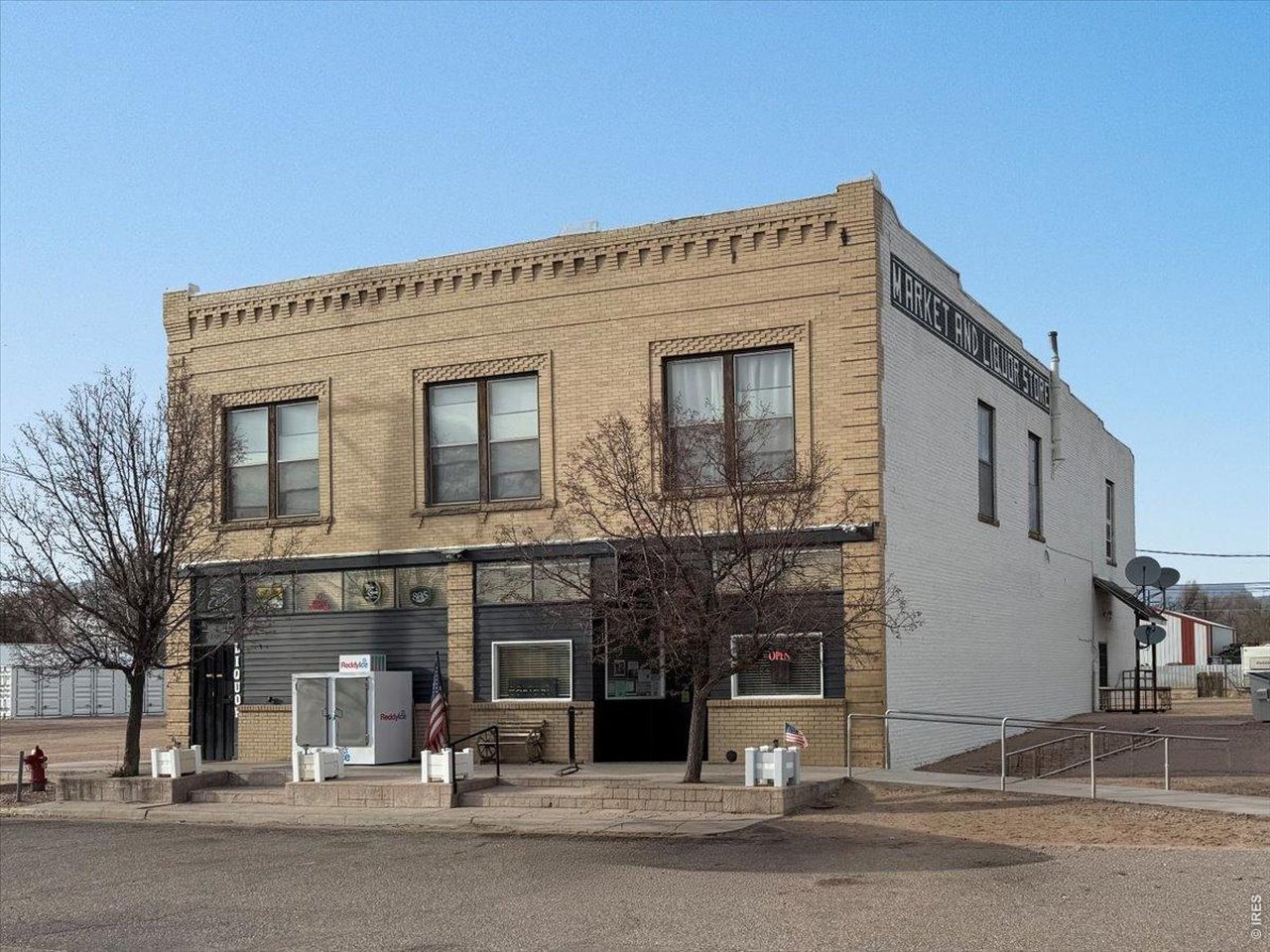 516 West Main Street Pierce, CO 80650 - Photo 3 of 24 a view of a building with a street