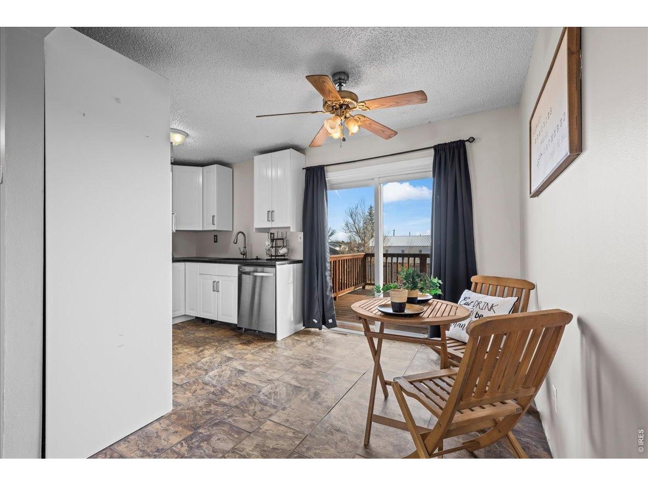516 West Main Street Pierce, CO 80650 - Photo 5 of 24 a dining room with furniture and window