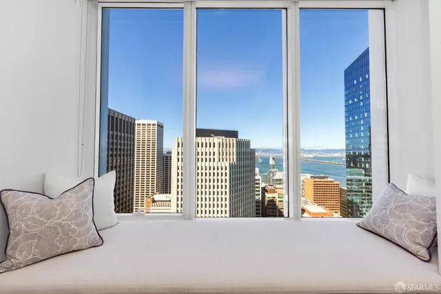 a bathroom with a tub and shower