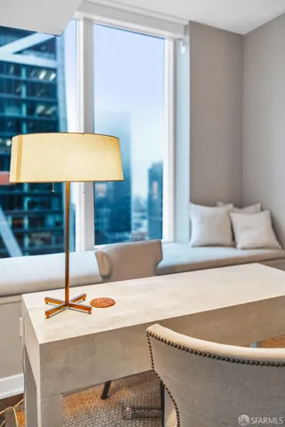 a kitchen with a table and chairs and stove