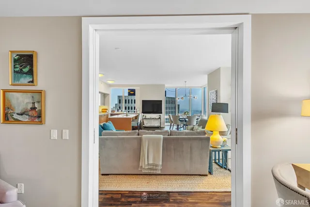 a living room with furniture and a window