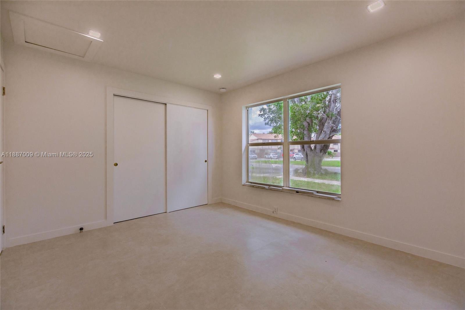 10760 Northwest 29th Manor Sunrise, FL 33322 - Photo 13 of 38 a view of an empty room with a window