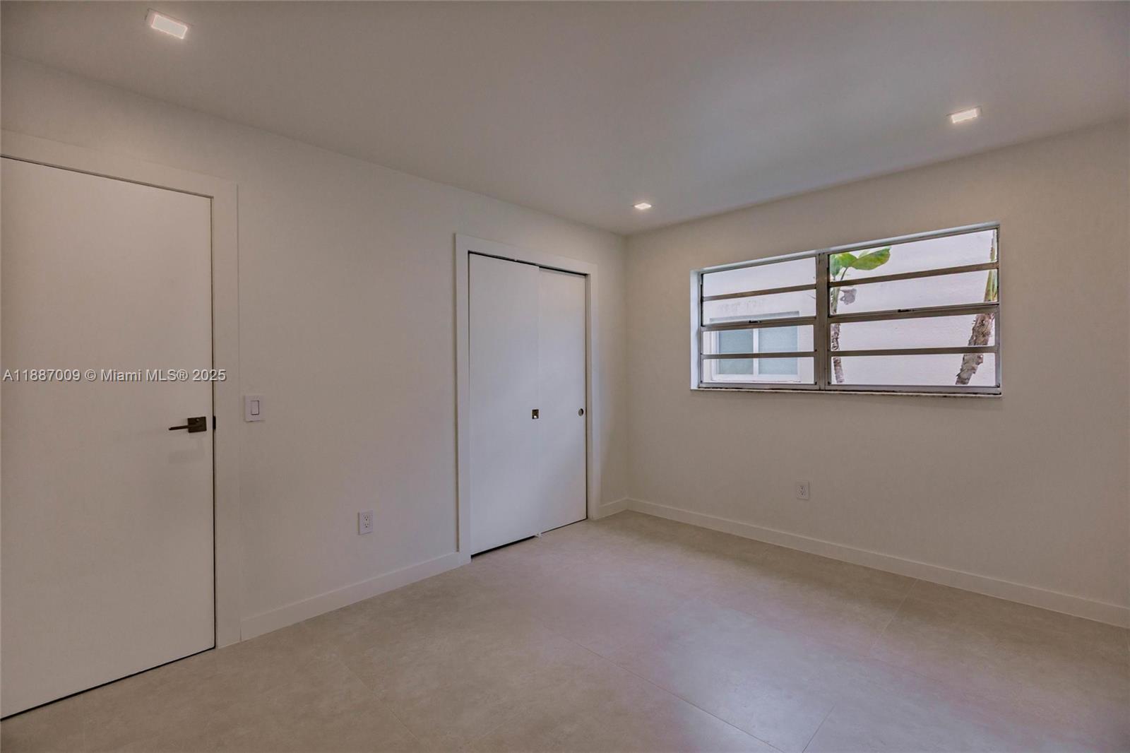 10760 Northwest 29th Manor Sunrise, FL 33322 - Photo 29 of 38 a view of empty room with windows
