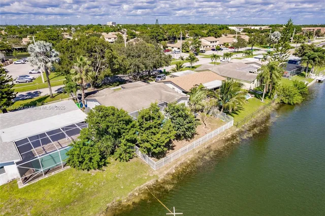 a view of a lake with a building in the background