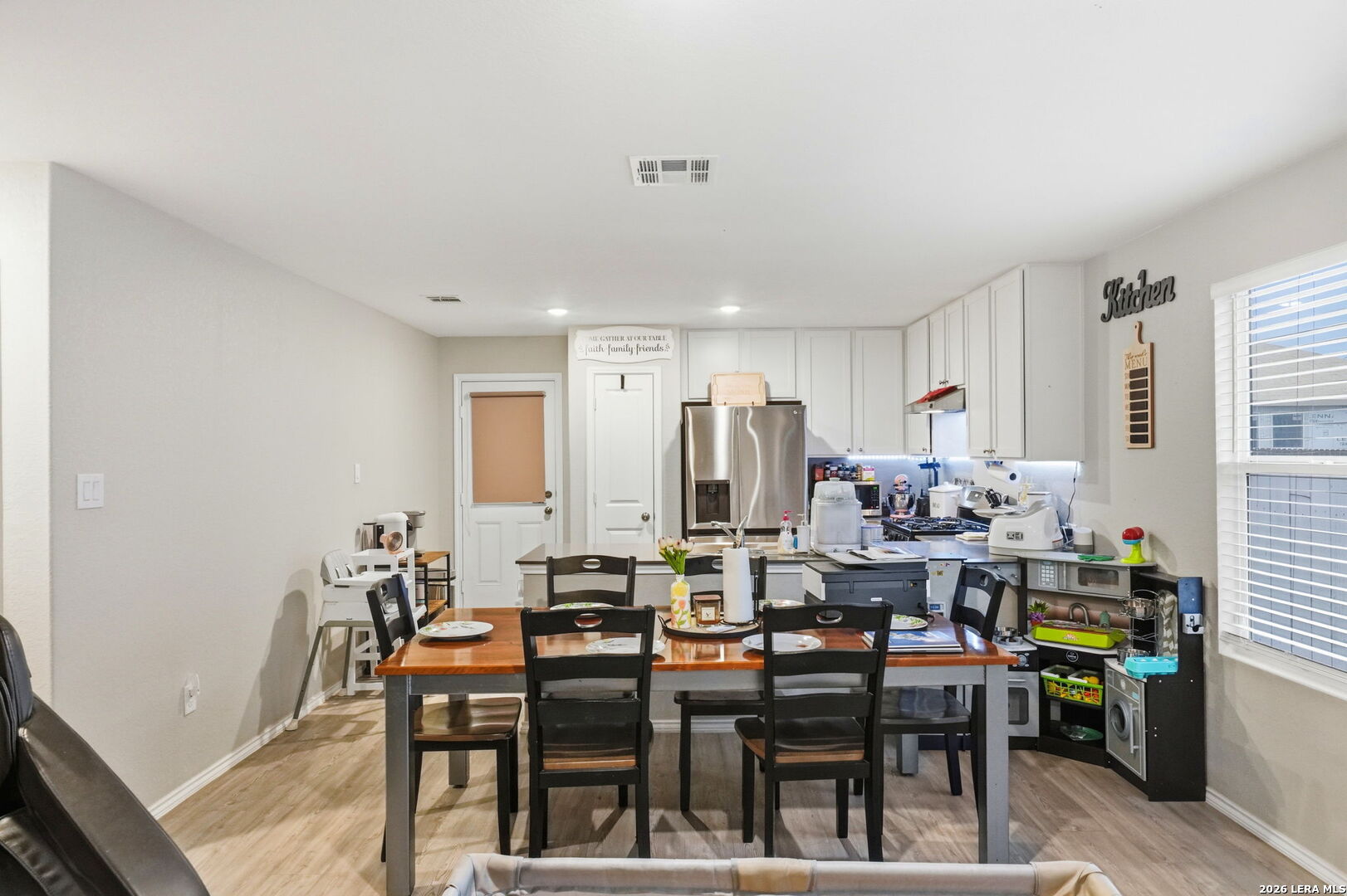 140 Maverick Cove Pleasanton, TX 78064 - Photo 12 of 26 a view of a dining room with furniture