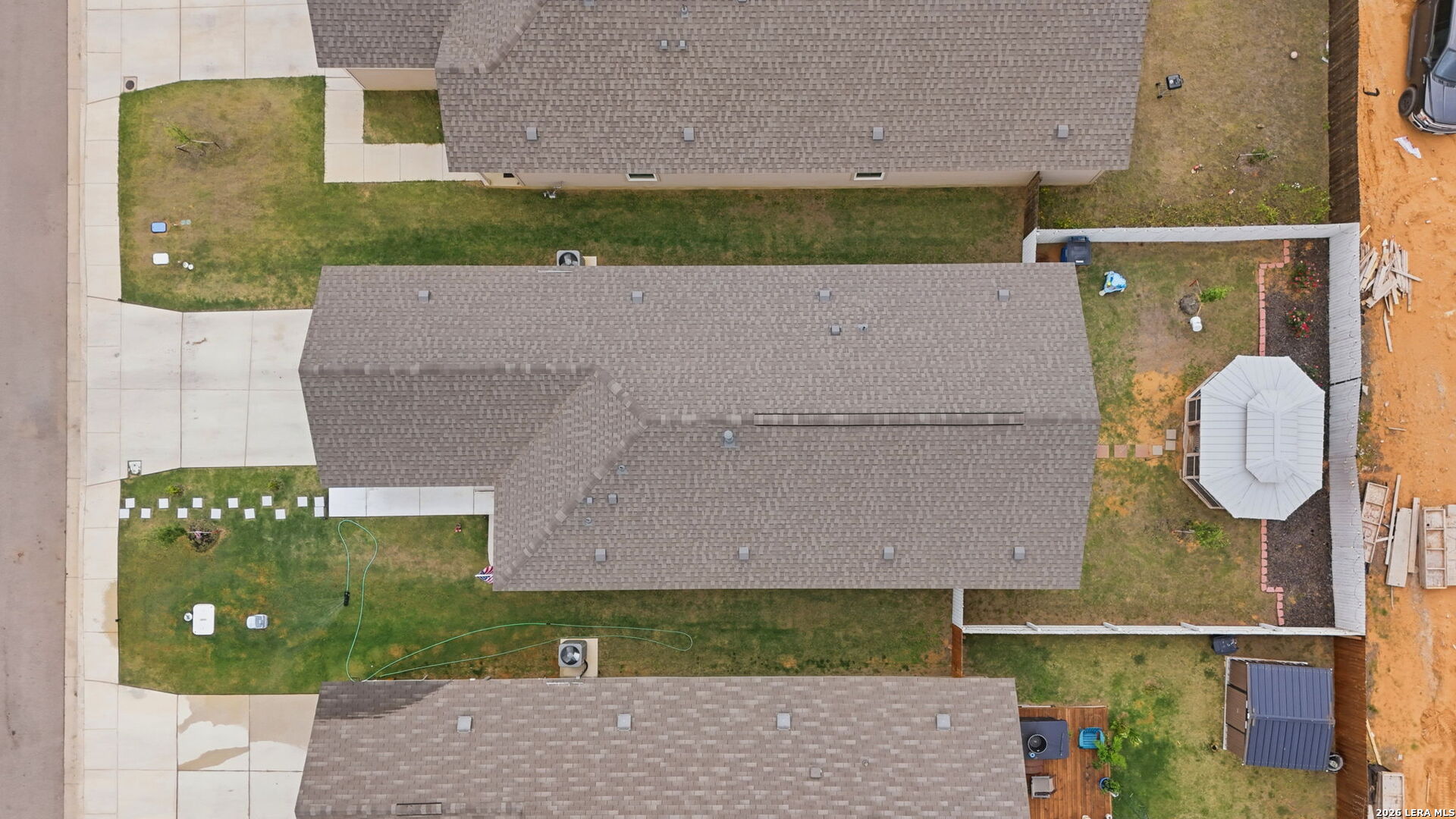 140 Maverick Cove Pleasanton, TX 78064 - Photo 24 of 26 an aerial view of a house with a swimming pool