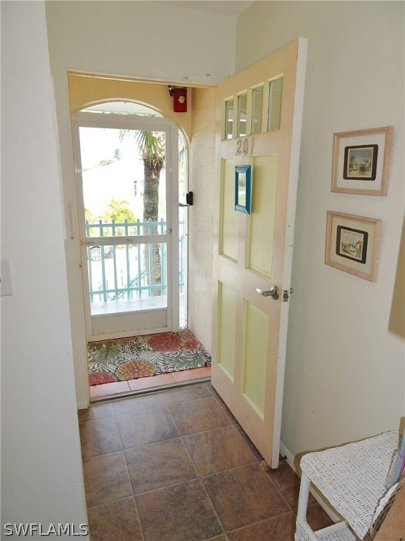 3215 Stringfellow Road, Unit 201 St. James City, FL 33956 - Photo 15 of 25 a view of room with window and gate