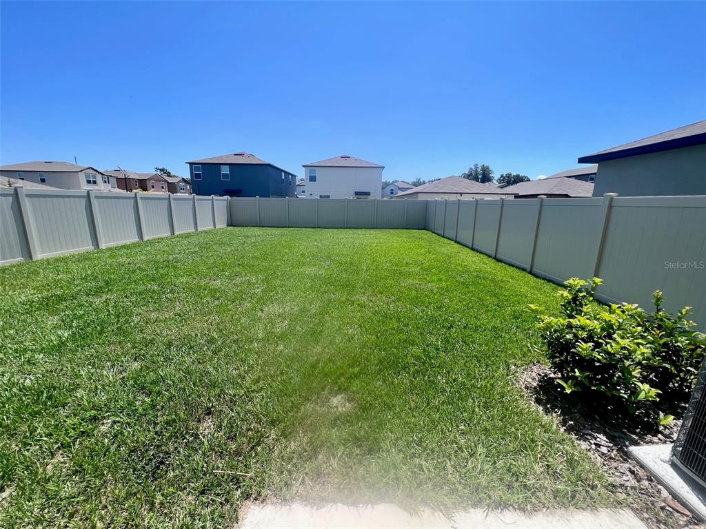 2170 Shining Azul Way Lutz, FL 33558 - Photo 14 of 16 a view of a backyard