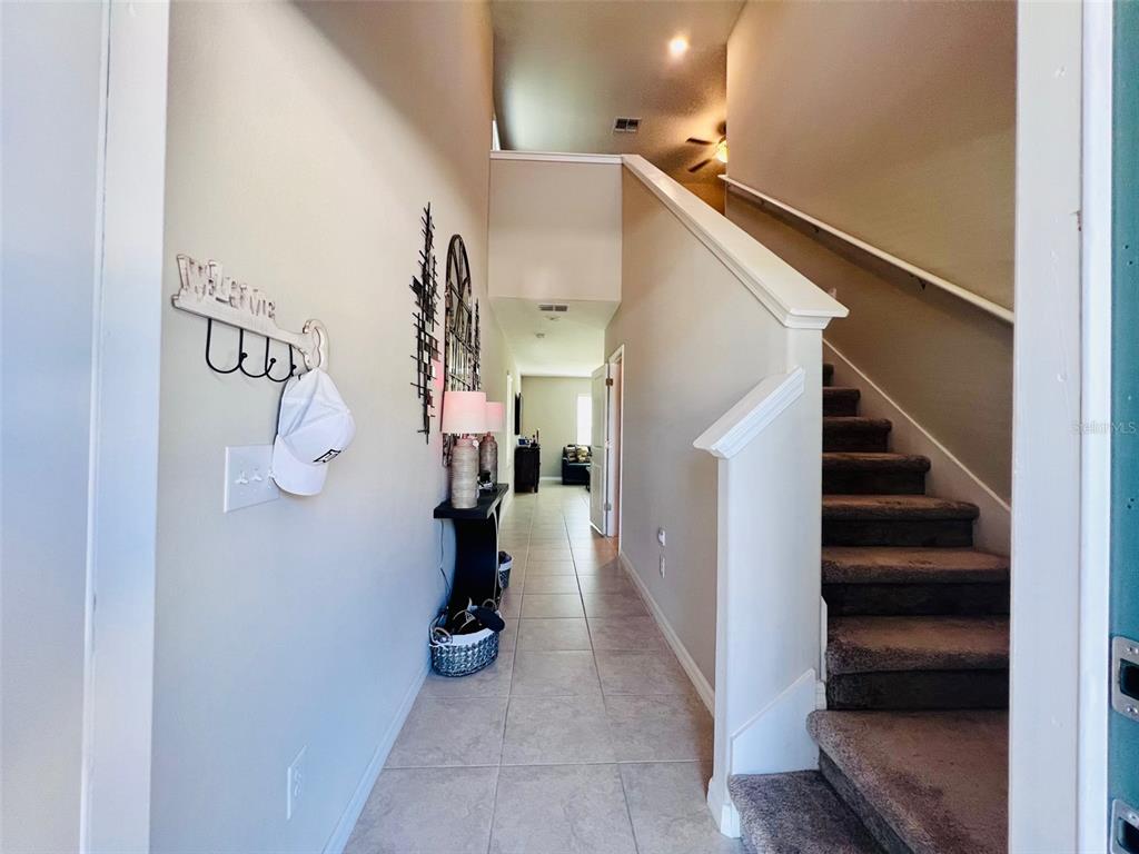 2170 Shining Azul Way Lutz, FL 33558 - Photo 4 of 16 a view of entryway and hall with a hallway