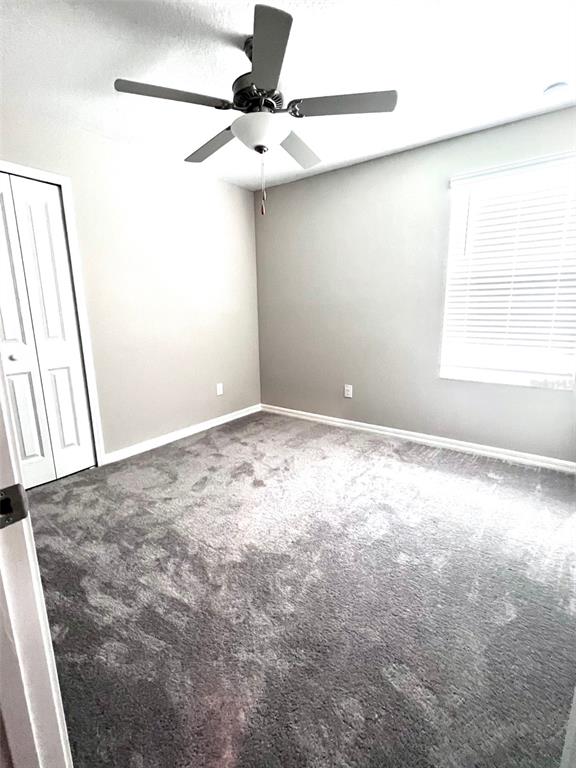 2170 Shining Azul Way Lutz, FL 33558 - Photo 8 of 16 an empty room with a window