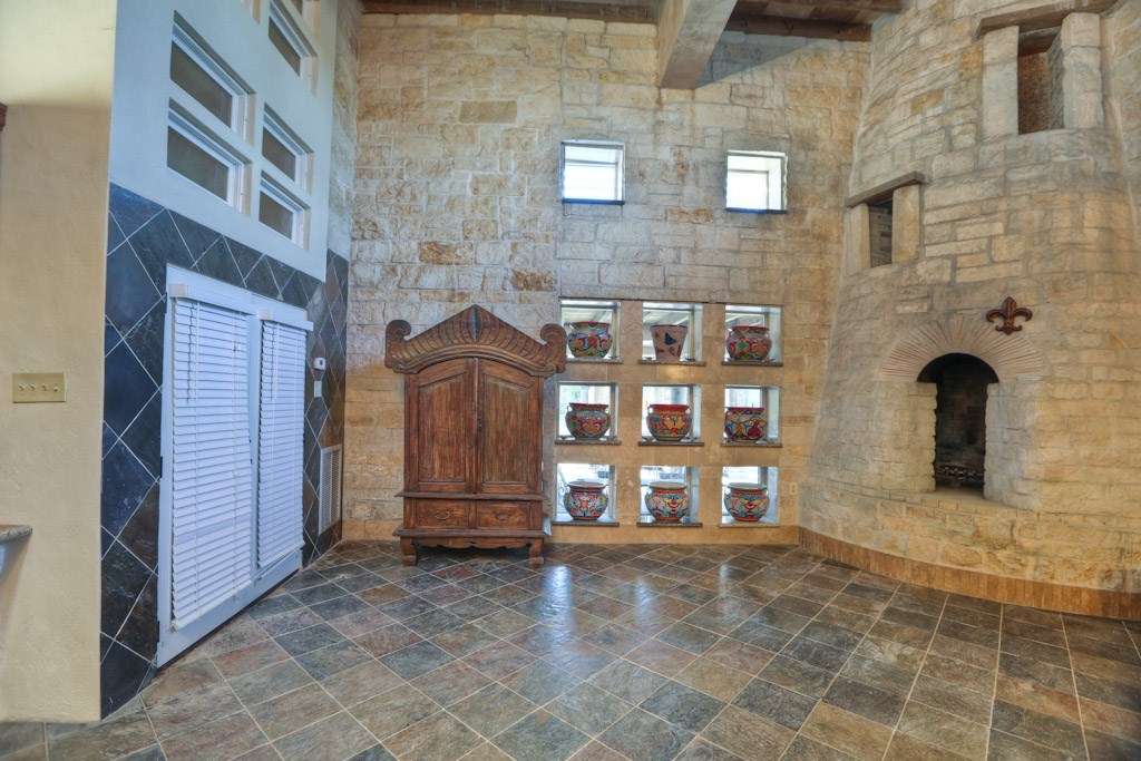 a view of a brick building with many windows