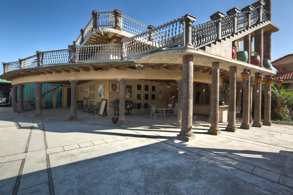614 Pine Gully Road, Unit LOFT Seabrook, TX 77586 - Photo 16 of 29 a view of a building with a pathway