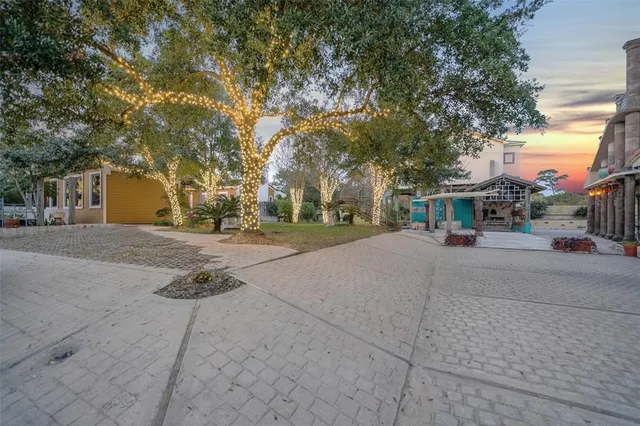 a view of swimming pool with outdoor seating